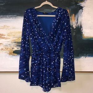 Blue, starry romper.